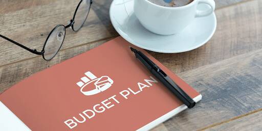 Budget Planning Book On Table 512x256 1